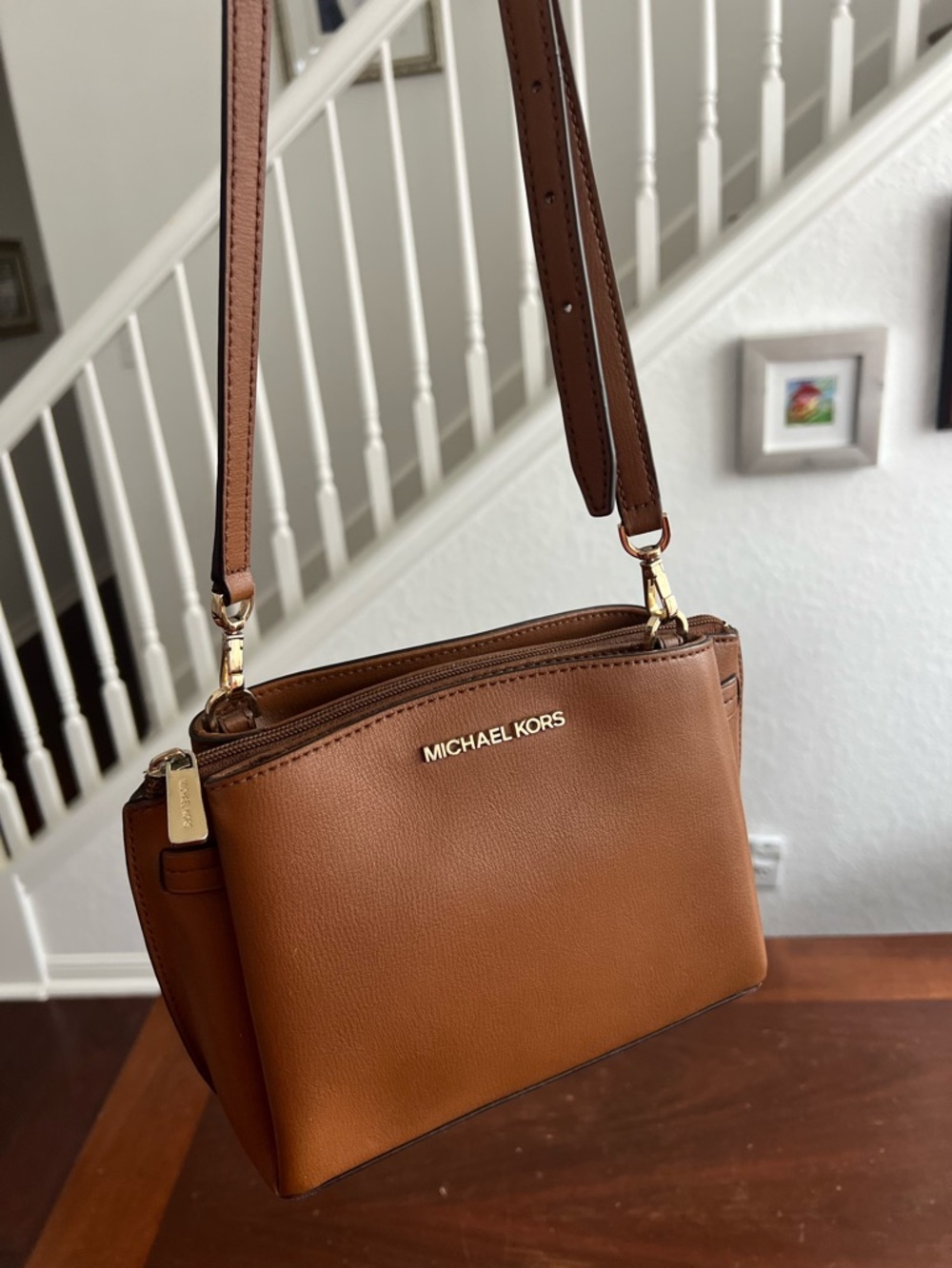 Michael Kors Rochelle MD
Messenger Leather Bag | 
~ 8.5 L x 6.5"H x 4" D.
